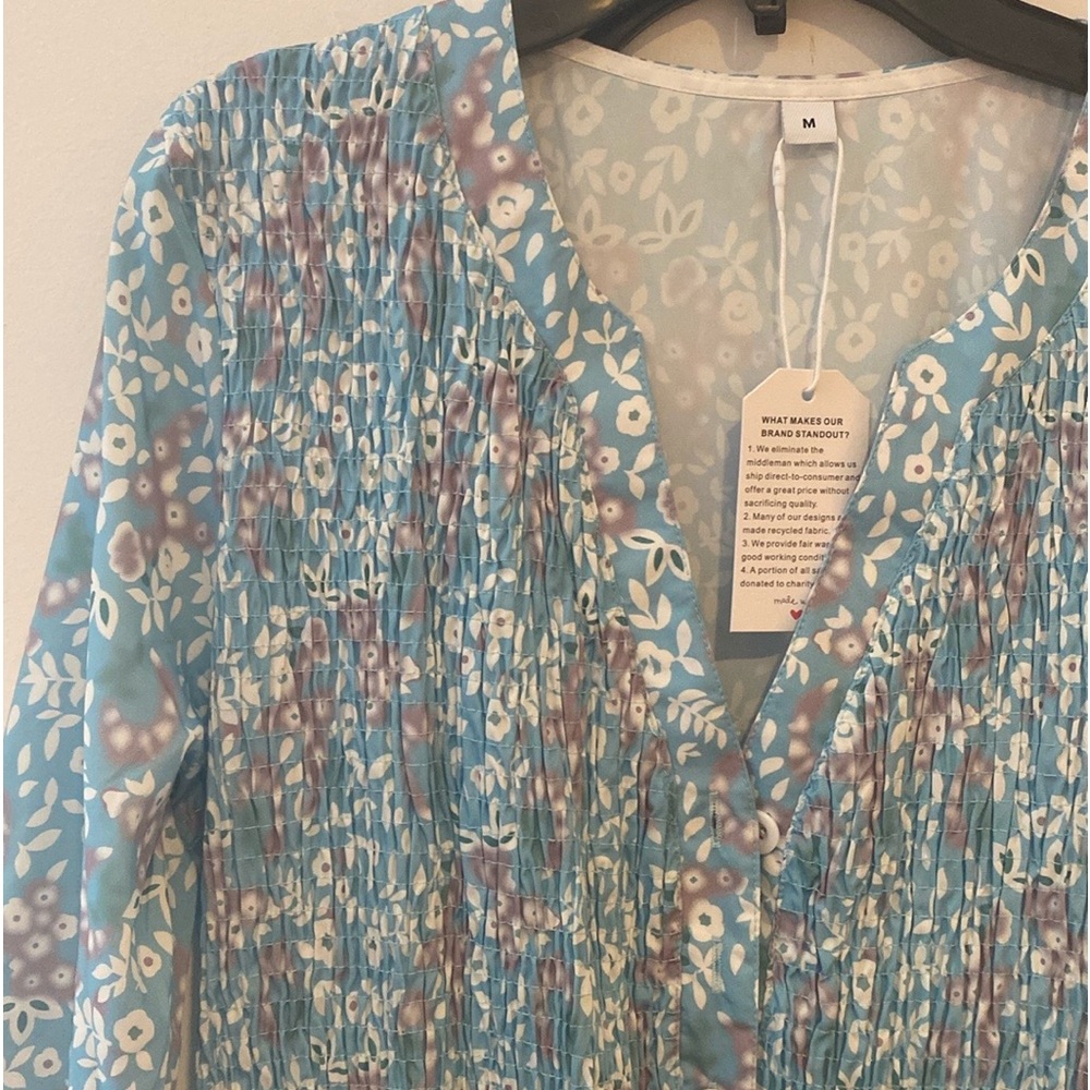 Blue flower dress, new with the tag.